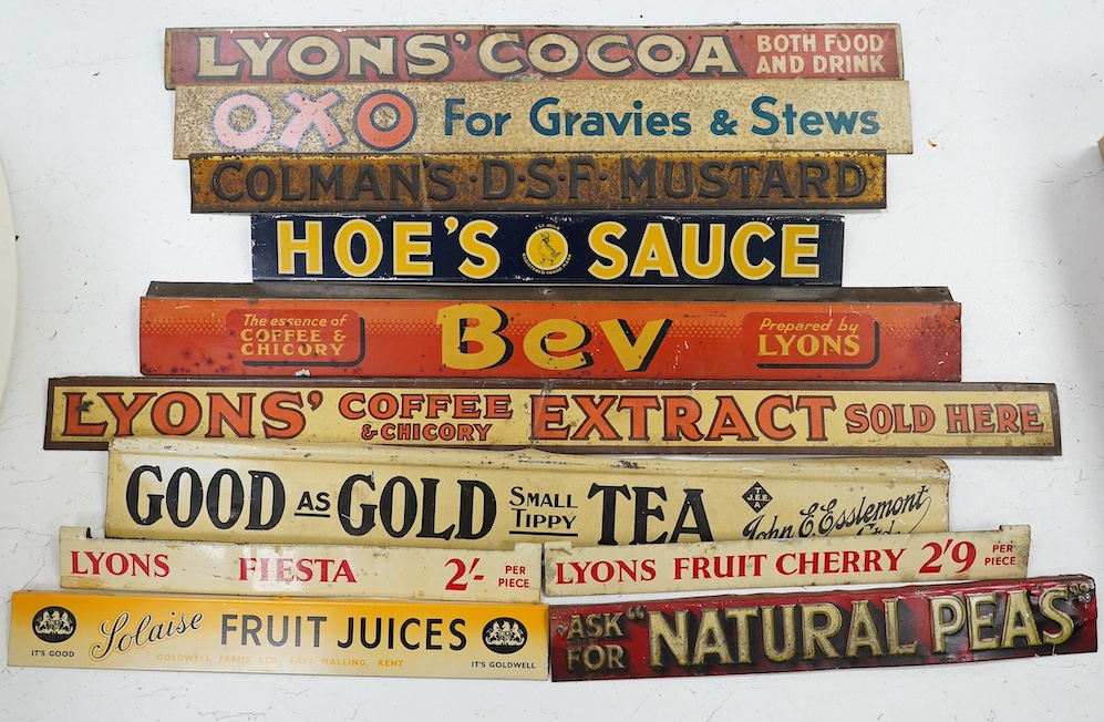 Eleven early / mid 20th century tinplate advertising shelf strips, largest 60cm. Condition - fair